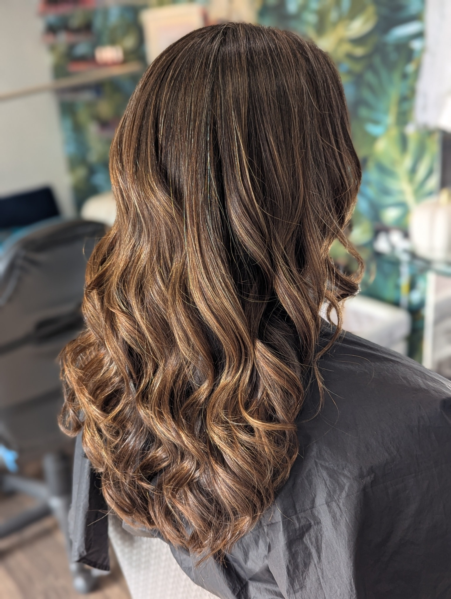 Brunette balayage with bouncy curls